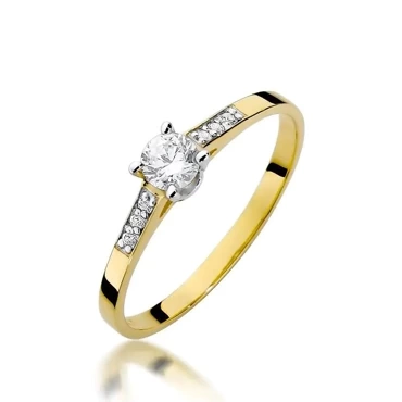 złoty pierścionek z brylantem 0.21ct