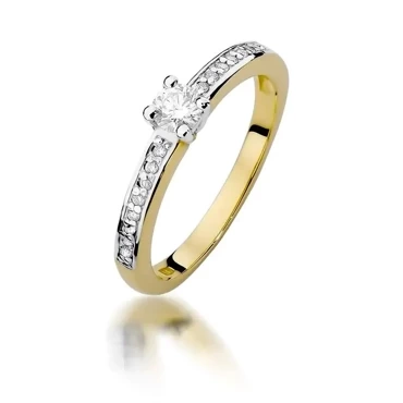 złoty pierścionek z brylantem 0.28ct